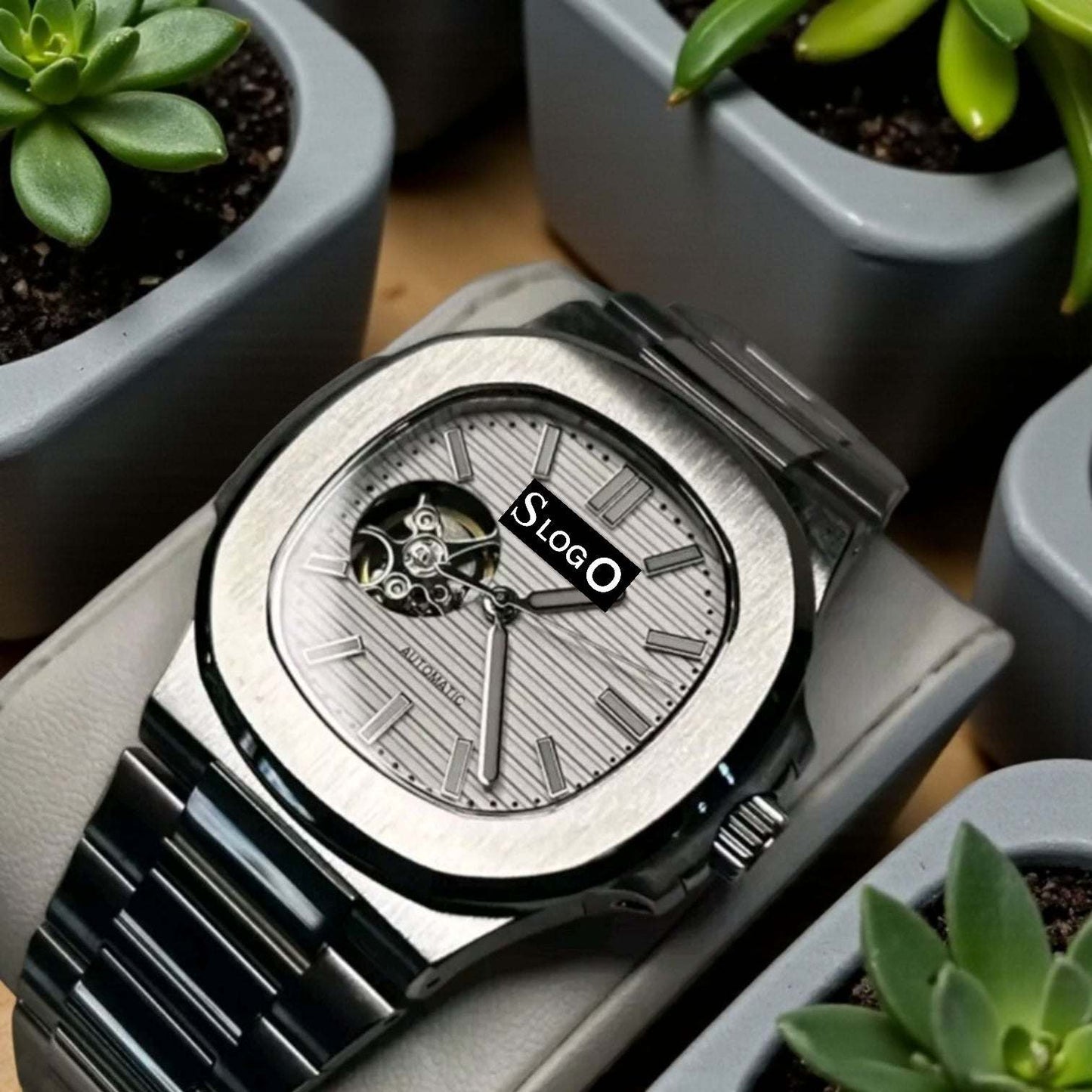 SeikNaut white dial Seiko Mod watch with open-heart design and stainless steel bracelet