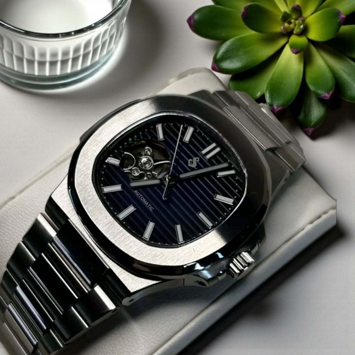 Seiko Mod Nautilus watch with open-heart black dial and stainless steel bracelet by Modtime Creations