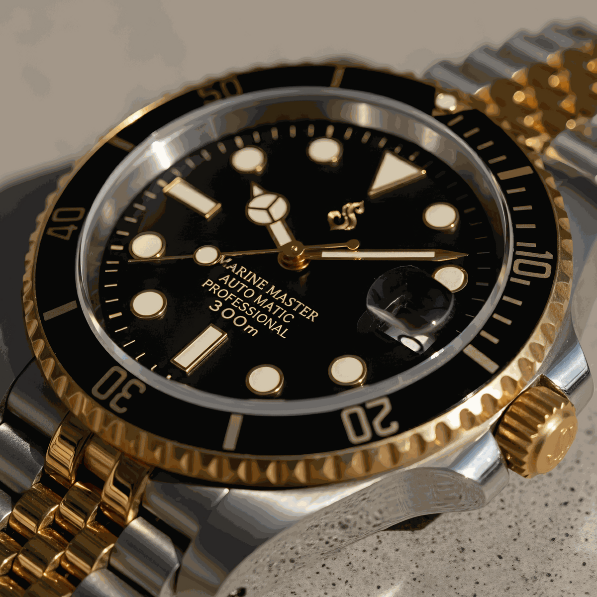 MODTIME Seiko Mod SubMariner two-tone black and gold diver watch with stainless steel jubilee bracelet and ceramic bezel.