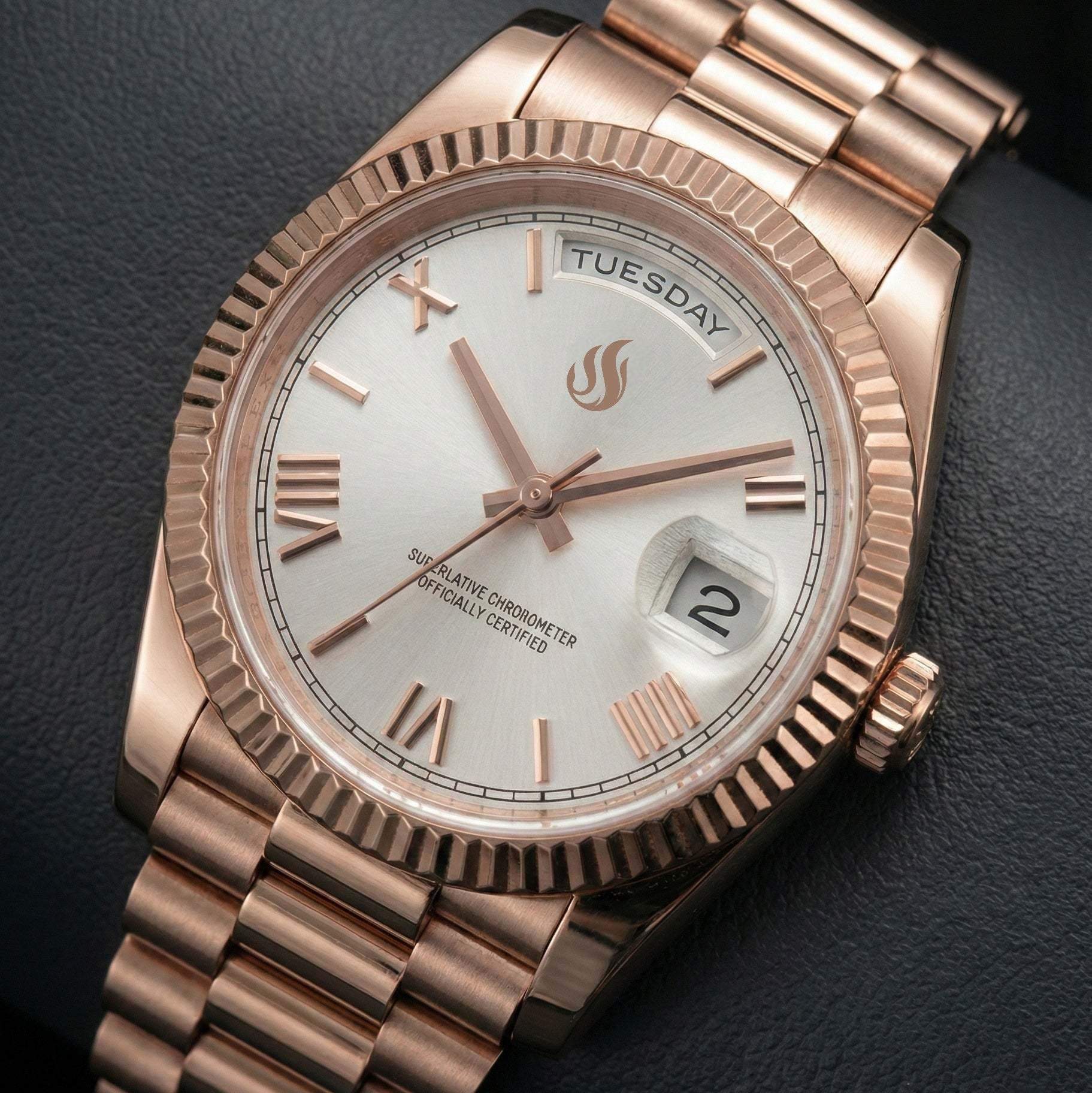 MODTIME rose gold automatic watch with white dial, Roman numerals, and day-date display on a stainless steel bracelet.