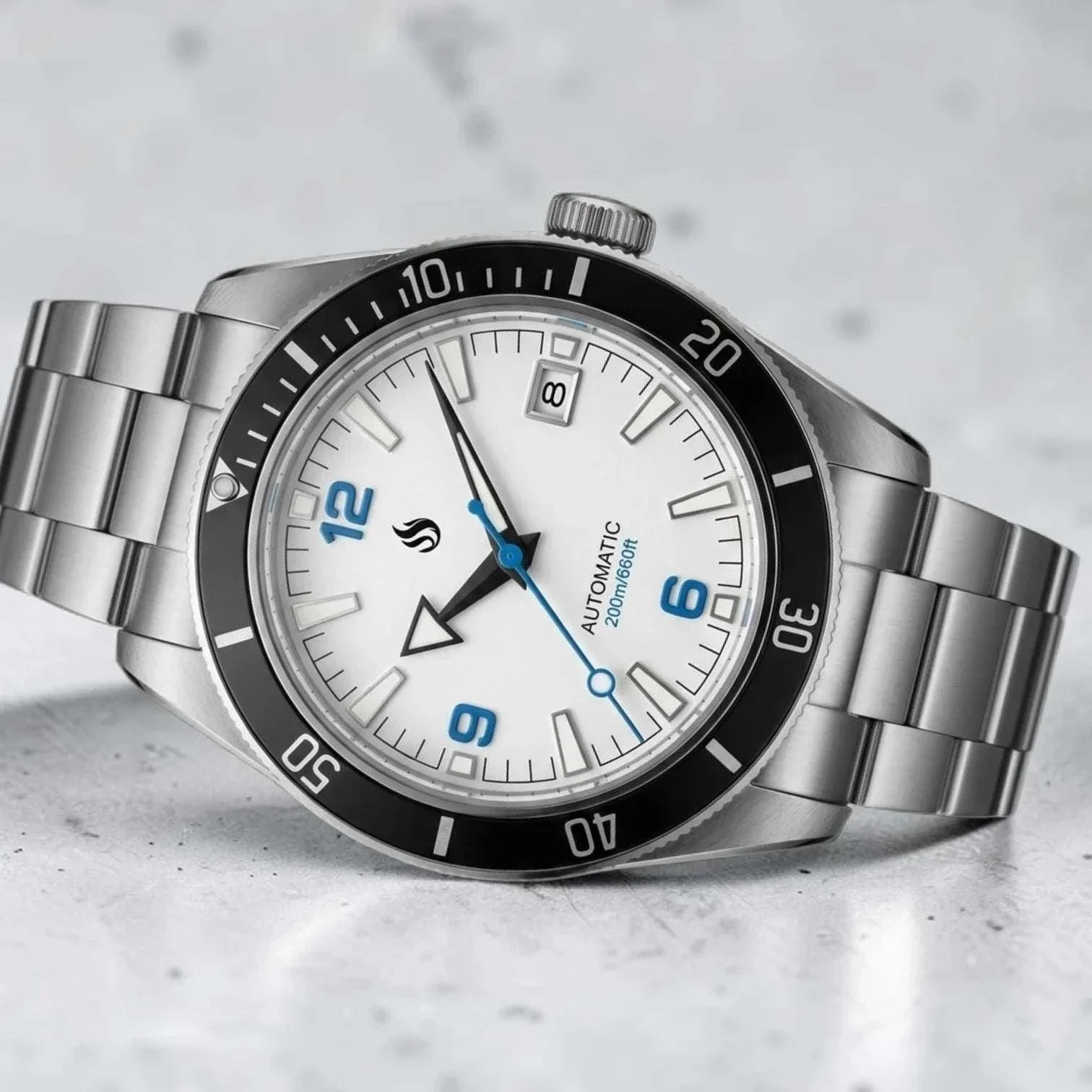 Seiko Mod Seamaster Tudor Fusion watch with a white dial and blue numbers by Modtime Creations 