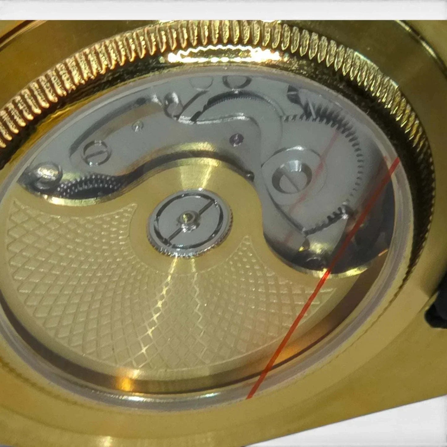 The back cover of a seiko mod submariner Gold color 