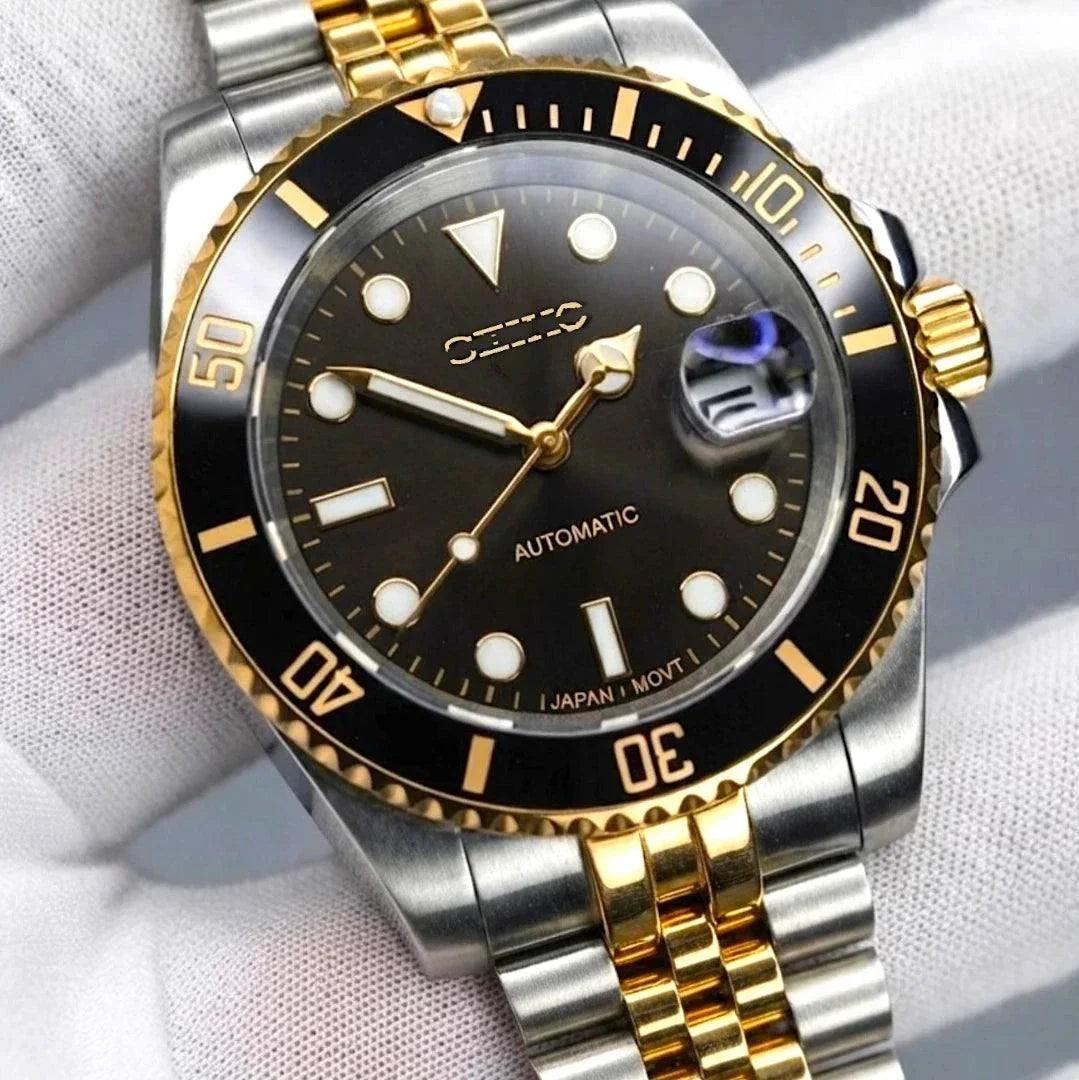 MODTIME Seiko Mod SubMariner two-tone black and gold diver watch with stainless steel jubilee bracelet and ceramic bezel.
