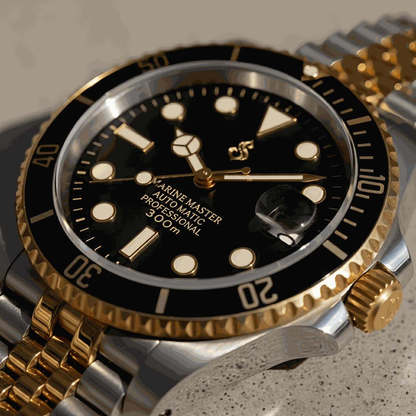 MODTIME Seiko Mod SubMariner two-tone black and gold diver watch with stainless steel jubilee bracelet and ceramic bezel.