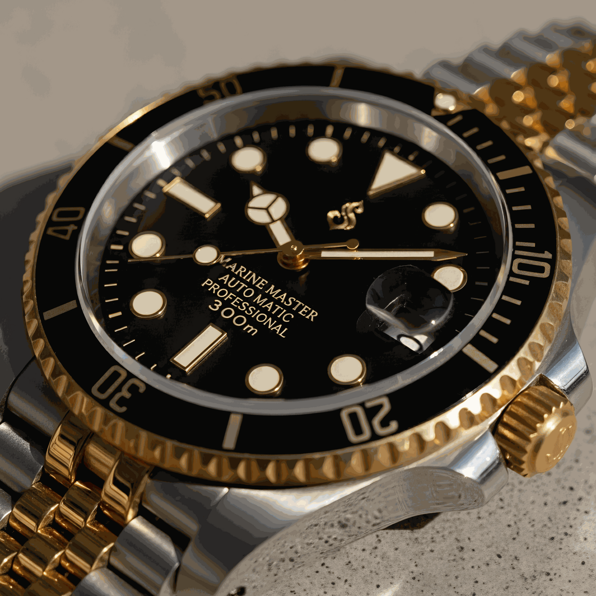 MODTIME Seiko Mod SubMariner two-tone black and gold diver watch with stainless steel jubilee bracelet and ceramic bezel.