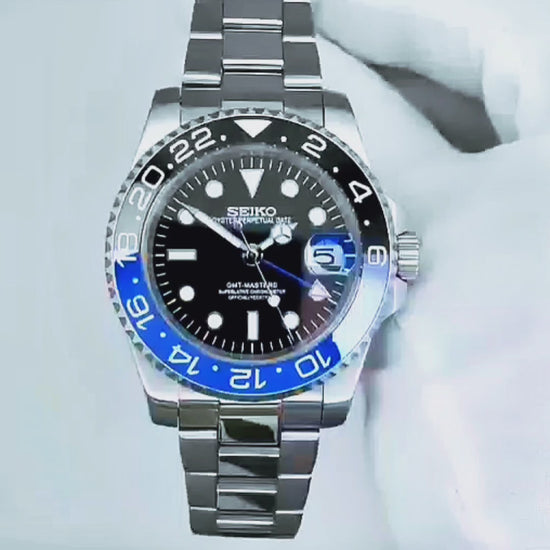 Close up video of a Seiko Mod GMT Batman 