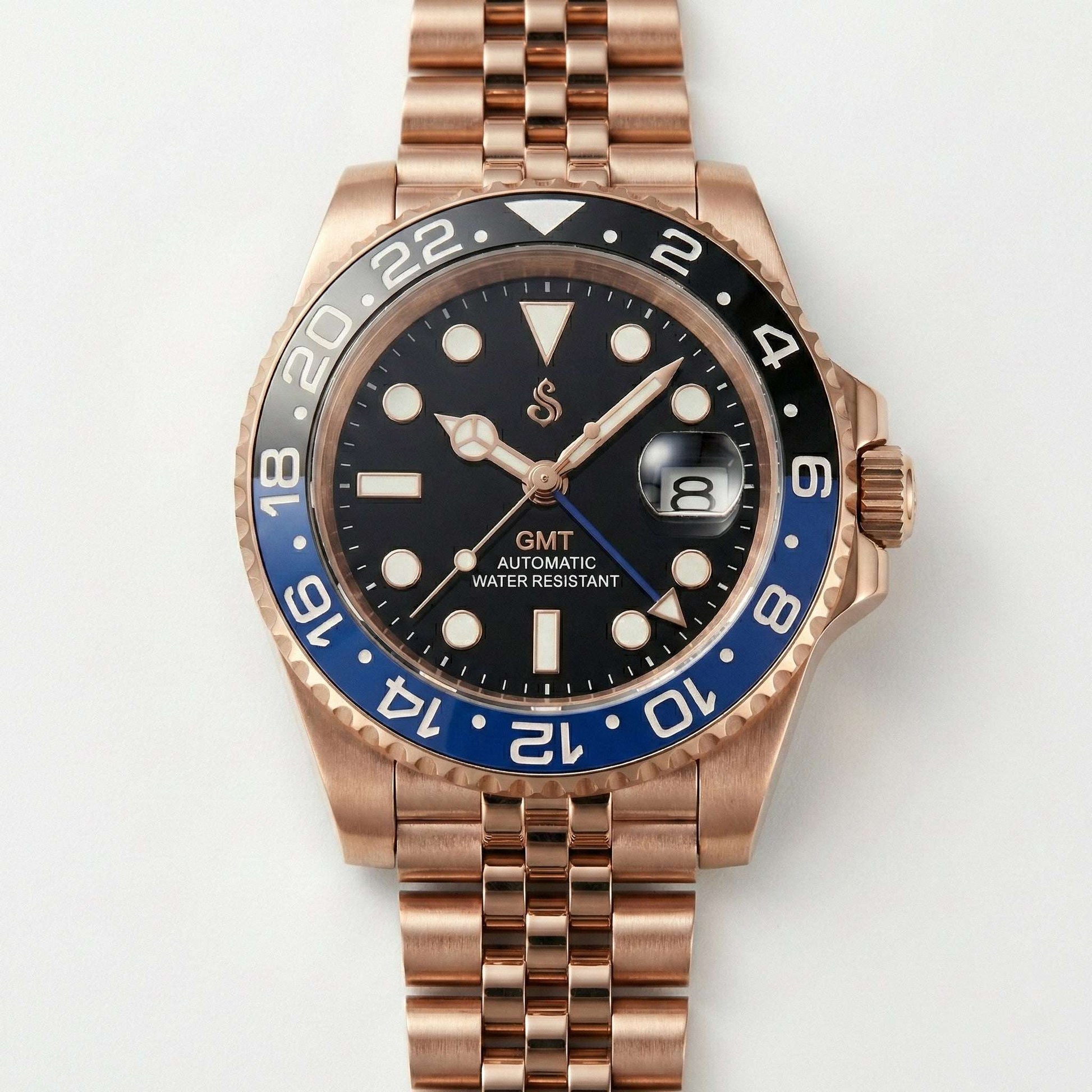 Modded Seiko SeikMariner GMT Batman Rose Gold luxury watch with black dial and ceramic bezel