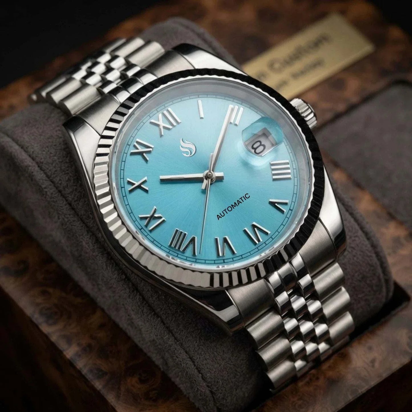 Seiko Mod Watch Datejust Tiffany Blue Dial with Roman Numeral Indices in a silver case and bracelet built by Modtime Creations 