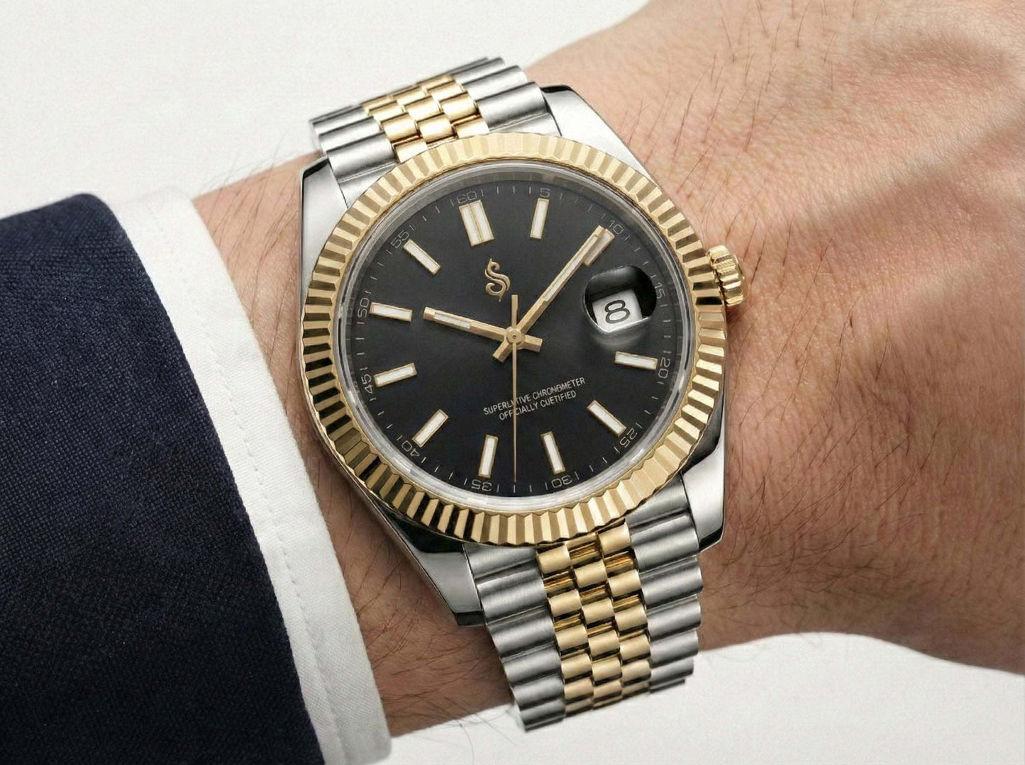 Two-tone SeikJust Seiko Mod watch with black dial and gold fluted bezel featuring date window and NH35 automatic movement