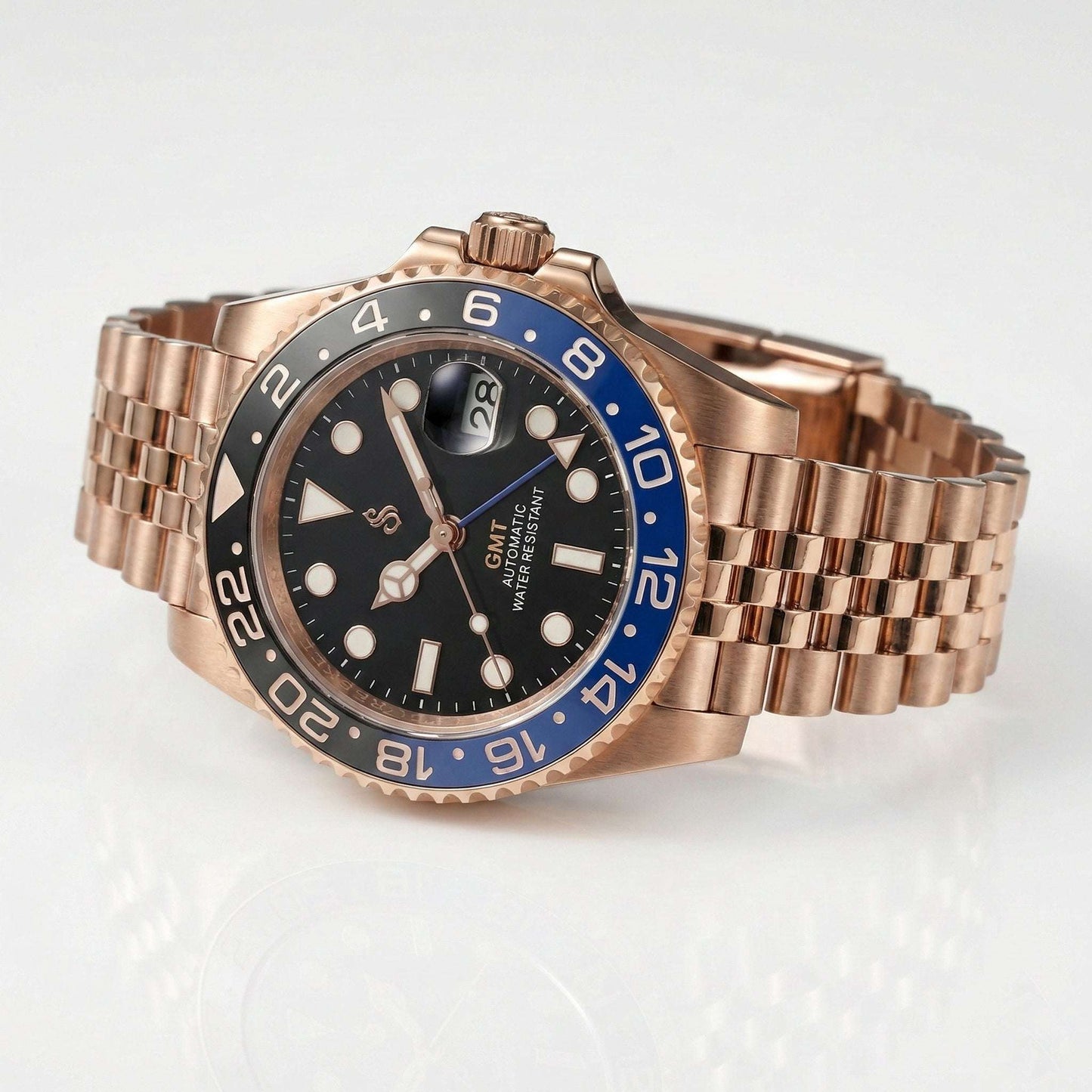 Modded Seiko SeikMariner GMT Batman Rose Gold watch with black dial and ceramic bezel
