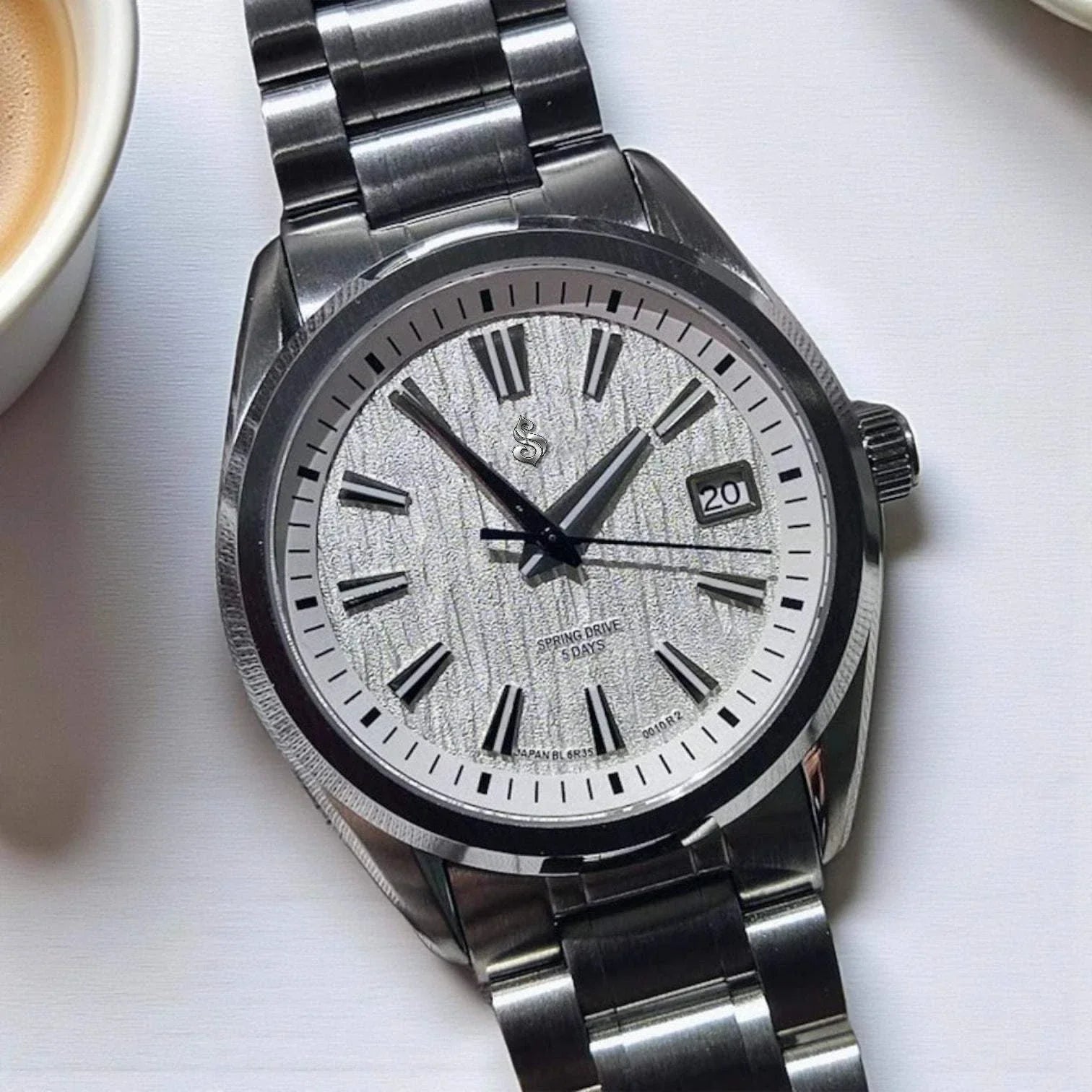 Modded Seiko luxury watch with white textured dial and sapphire crystal by Modtime Creations