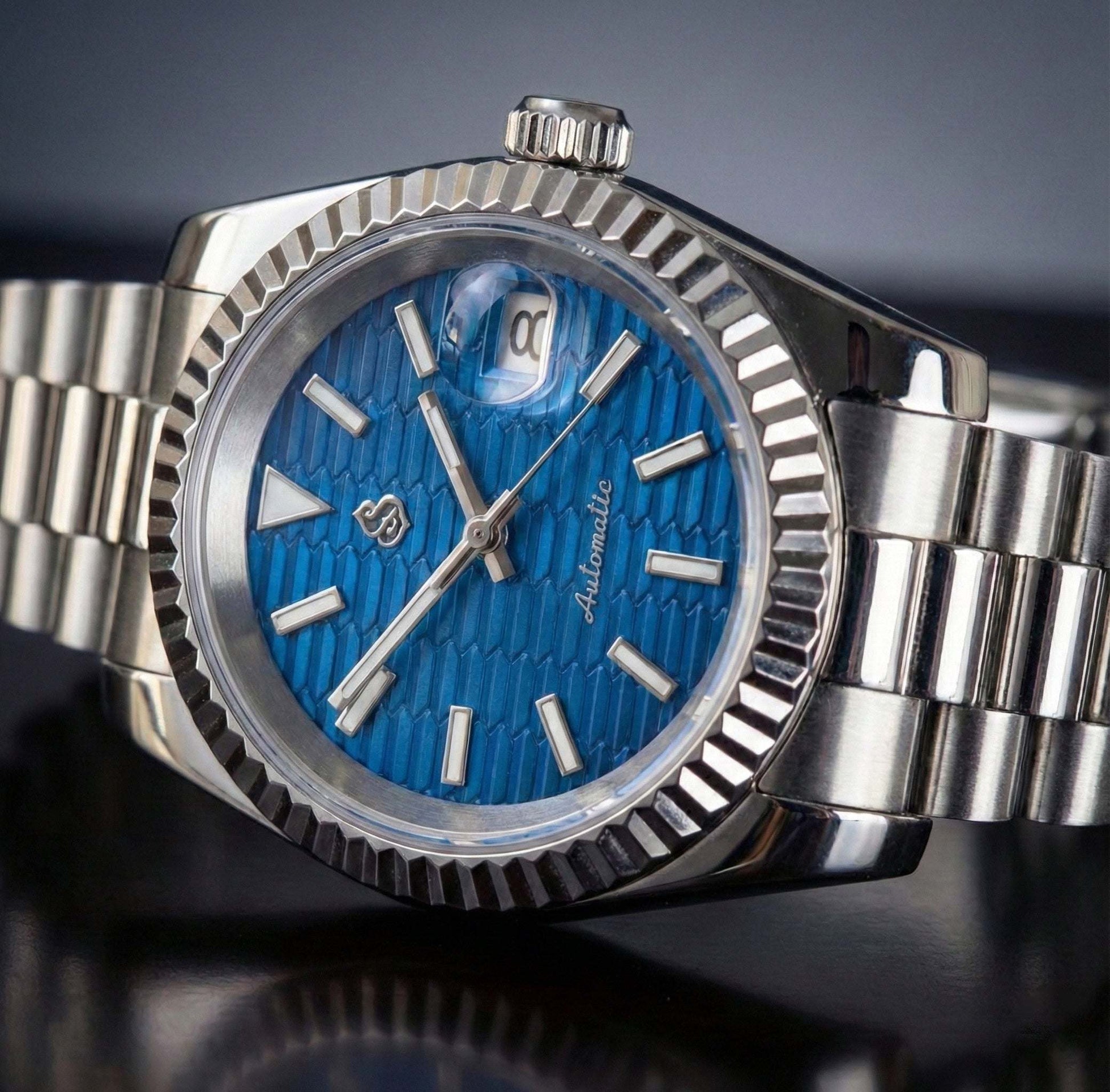 Seiko Modtime Luxury Mod watch with blue ripple motif dial and date window