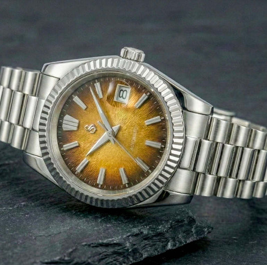 SeikJust luxury Seiko mod watch with textured grand gold date window dial and stainless steel case