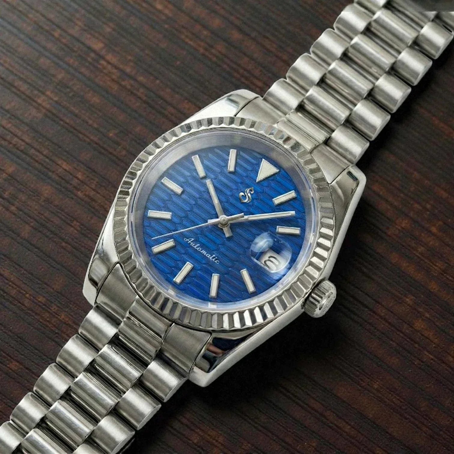 SeikJust date window watch with blue ripple motif dial by Modtime Creations featuring NH35 automatic movement and sapphire crystal