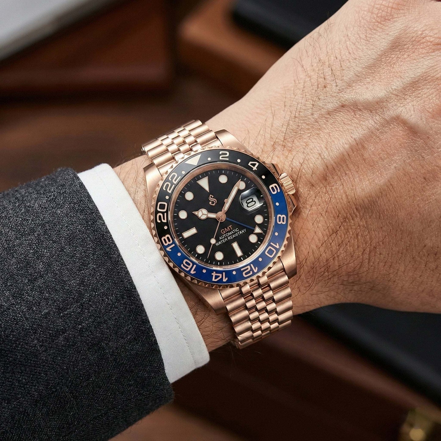 Modded Seiko SeikMariner GMT Batman rose gold luxury watch with black dial and ceramic bezel