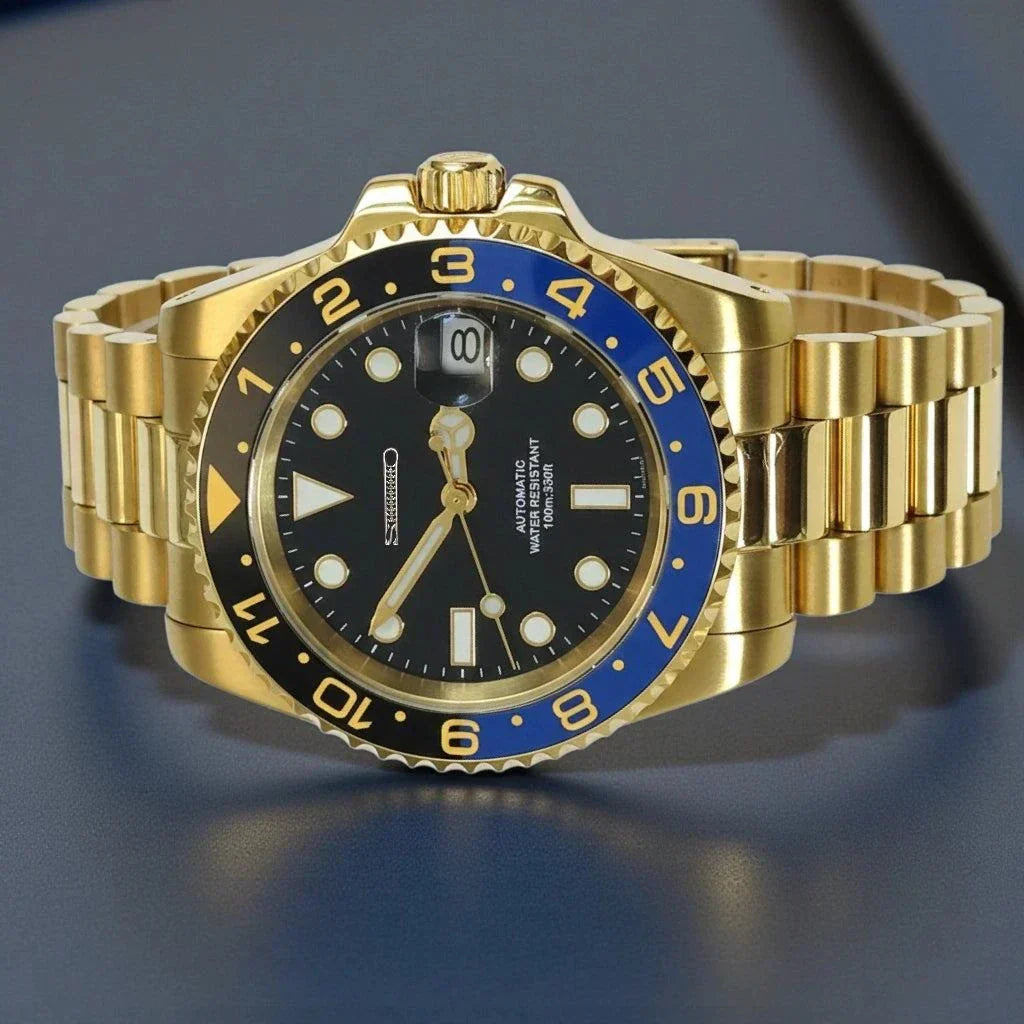 SeikMariner Gold Batman Seiko Mod luxury diver watch with blue and black bezel and stainless steel bracelet
