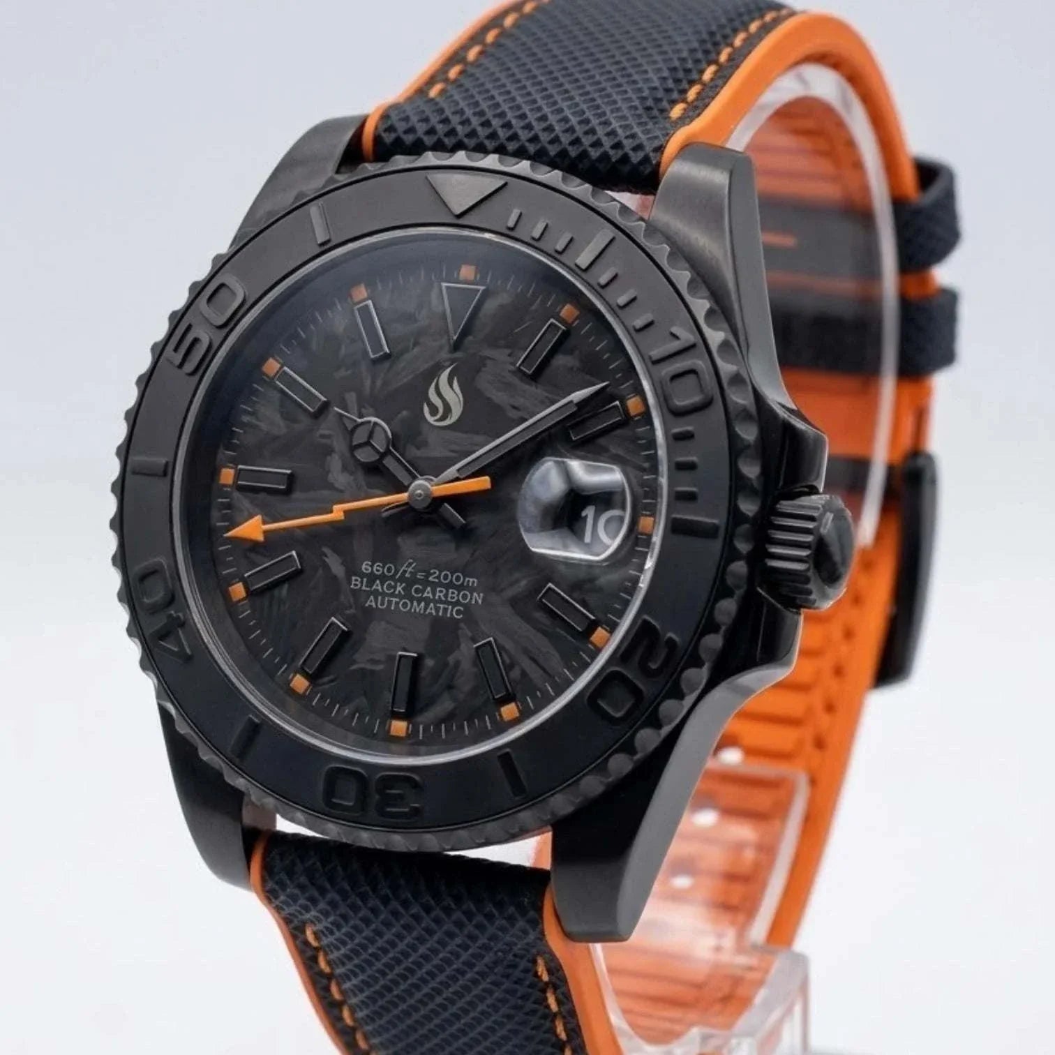 Seiko Mod watches. A close-up of a custom black carbon automatic Yachtmaster watch with a textured black and orange strap, featuring a dark dial and date window. 